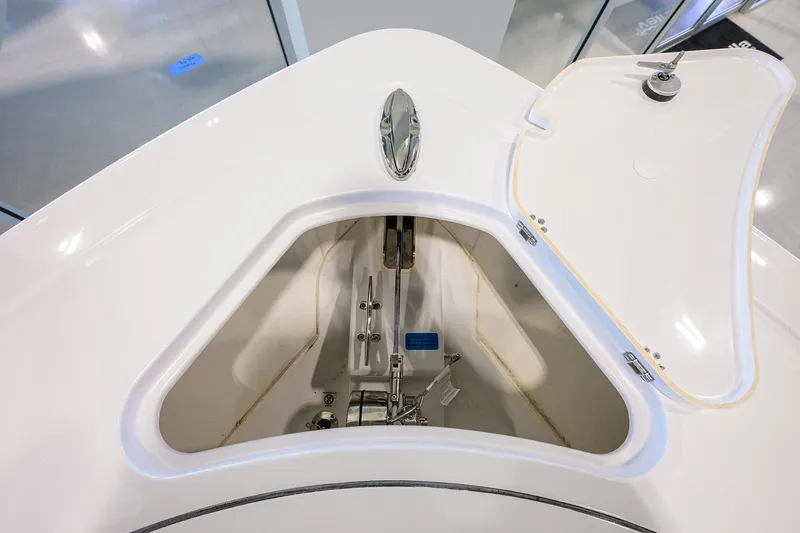 Slide: The Image of 2025 Sportsman Open 352 boat anchor compartment, open hatch, modern design. - 8