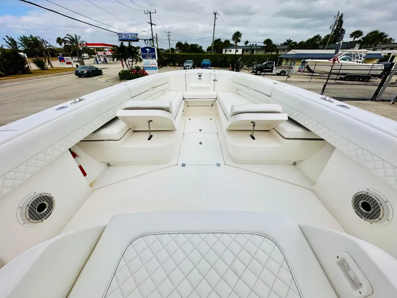 Slide: The Image of 2004 Intrepid 370 Open boat with spacious seating and sleek design. - 20