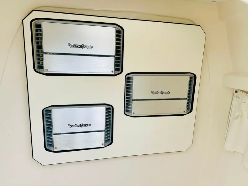 Slide: The Image of Rockford Fosgate amplifiers installed on a 2004 Intrepid 370 Open boat. - 31