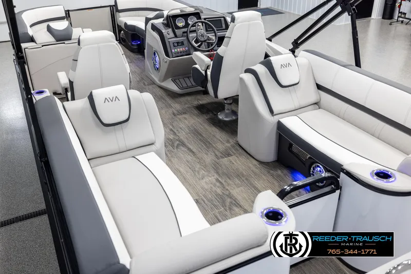 Slide: The Image of Luxurious interior of 2025 Avalon Catalina QL pontoon boat with modern seating and controls. - 11