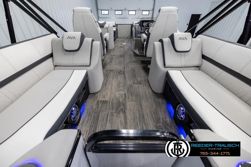 Slide: The Image of Luxurious interior of 2025 Avalon Catalina QL pontoon boat with modern seating and ambient lighting. - 16