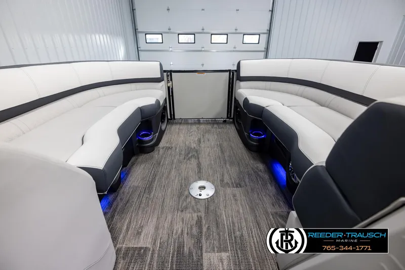 Slide: The Image of Interior of 2025 Avalon Catalina QL pontoon boat with luxurious seating and ambient lighting. - 18