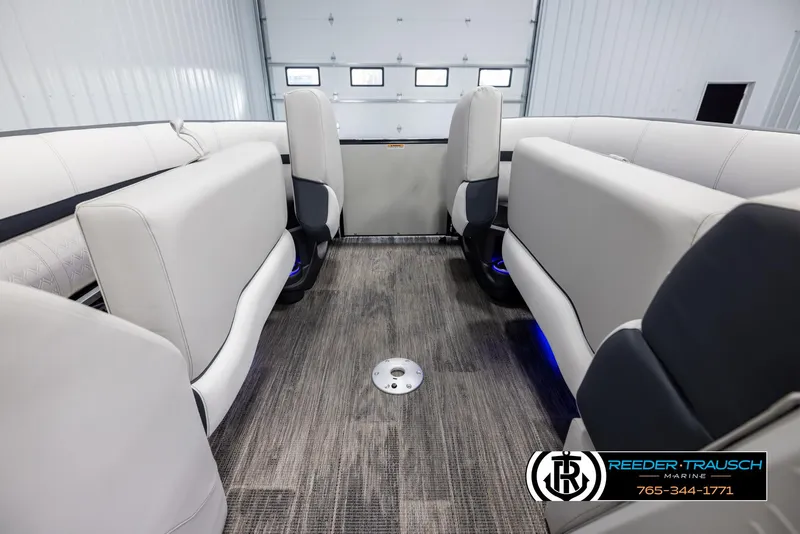 Slide: The Image of Interior of 2025 Avalon Catalina QL pontoon boat with plush seating and modern design. - 19