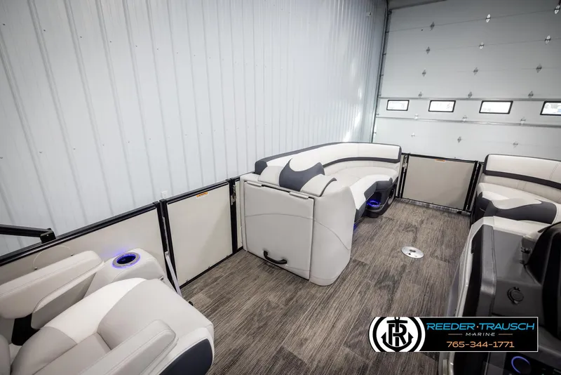 Slide: The Image of 2025 Avalon Catalina QL pontoon boat interior with plush seating and modern design. - 21