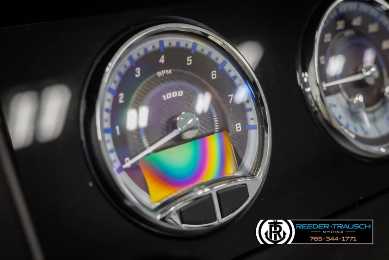 Slide: The Image of Close-up of 2025 Avalon Catalina QL dashboard gauges with RPM indicator. - 31