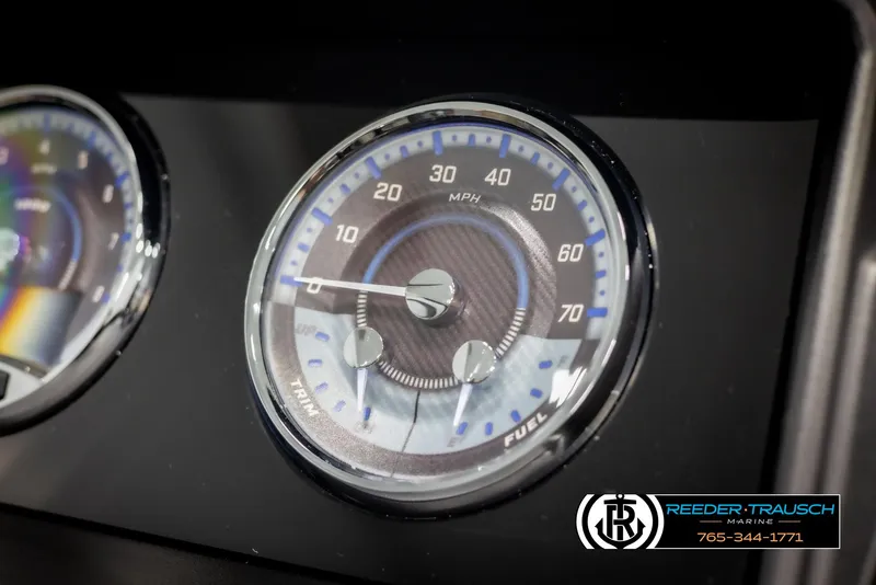 Slide: The Image of Close-up of 2025 Avalon Catalina QL speedometer and fuel gauge, displaying MPH and fuel levels. - 32