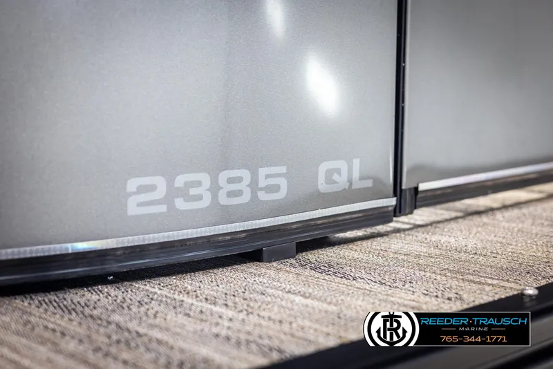 Slide: The Image of 2025 Avalon Catalina QL boat with "2385 QL" marking, Reeder Trausch Marine logo visible. - 42