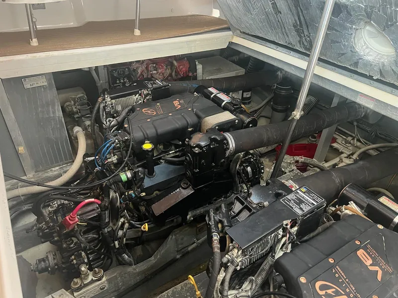 Slide: The Image of Engine compartment of a 1998 Sea Ray 400 Sundancer boat. - 27