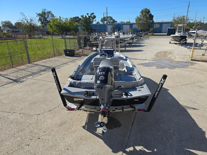 Slide: The Image of 2022 Xpress H20B boat with outboard motor in a sunny outdoor setting. - 5