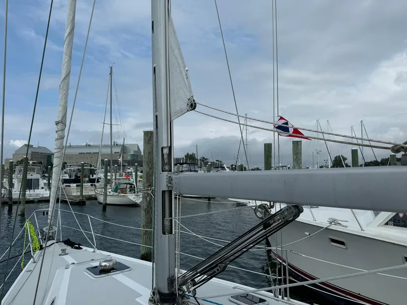 Slide: The Image of Catalina 42 MkII sailboat docked at marina, cloudy sky, 2004 model. - 11
