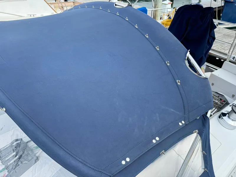 Slide: The Image of Blue canvas cover on 2004 Catalina 42 MkII sailboat, docked at marina. - 13