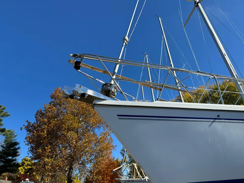 Slide: The Image of Catalina 42 MkII sailboat, 2004 model, docked under clear blue sky. - 16