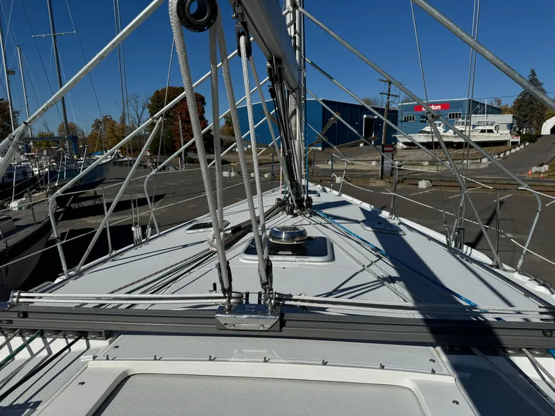 Slide: The Image of Catalina 42 MkII sailboat deck, 2004 model, docked with rigging and clear blue sky. - 22