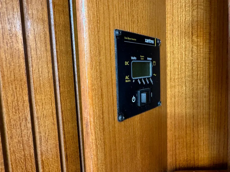 Slide: The Image of Xantrex power panel on 2004 Catalina 42 MkII sailboat interior. - 46