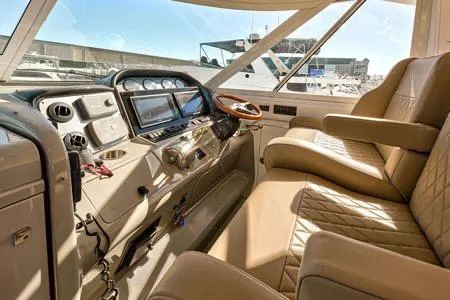 Slide: The Image of Luxurious 2008 Sea Ray 40 Motor Yacht cockpit with leather seating and modern controls. - 29