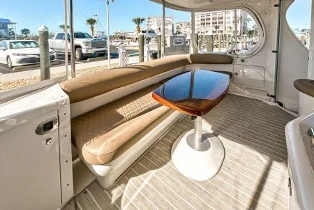 Slide: The Image of 2008 Sea Ray 40 Motor Yacht interior with elegant seating and table. - 32