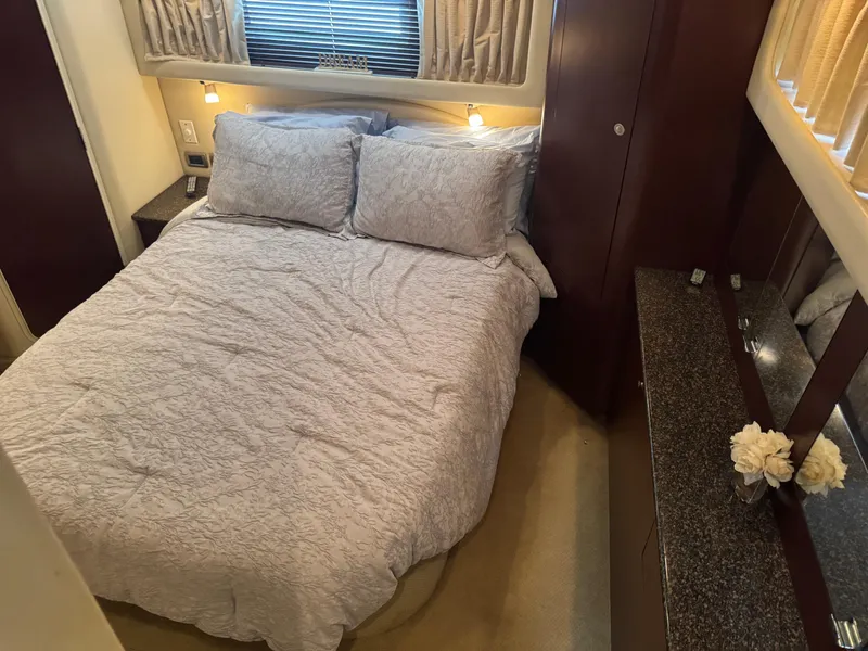 Slide: The Image of Luxurious bedroom interior of 2008 Sea Ray 40 Motor Yacht with elegant bedding and decor. - 48
