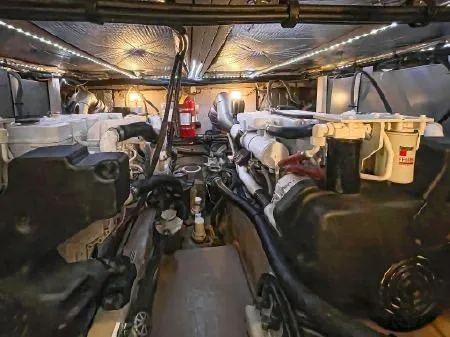 Slide: The Image of Engine room of 2008 Sea Ray 40 Motor Yacht with visible machinery and equipment. - 92