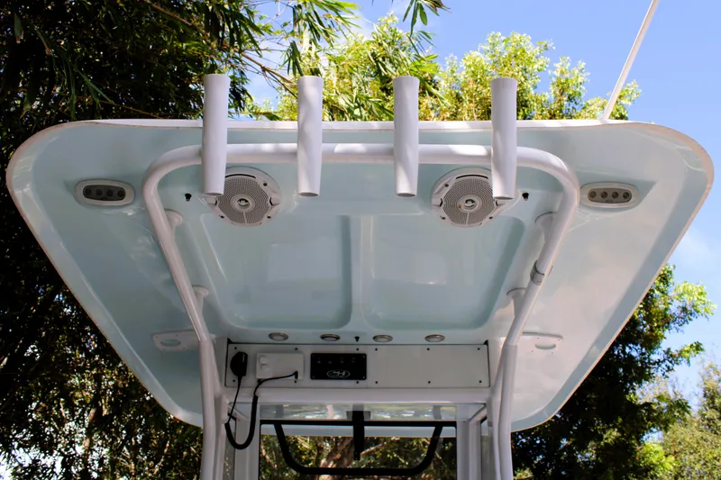 Slide: The Image of 2018 Sea Hunt Ultra 255 SE boat top with rod holders and speakers. - 22