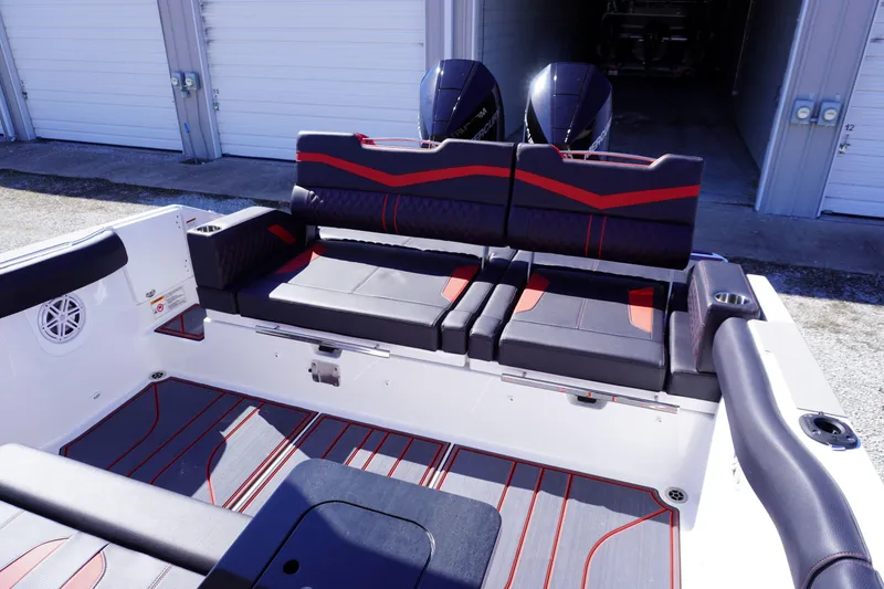 Slide: The Image of 2025 Monterey Elite 30 OB boat interior with stylish seating and modern design. - 12