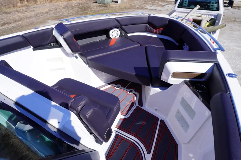 Slide: The Image of 2025 Monterey Elite 30 OB boat interior with luxurious seating and modern design. - 17
