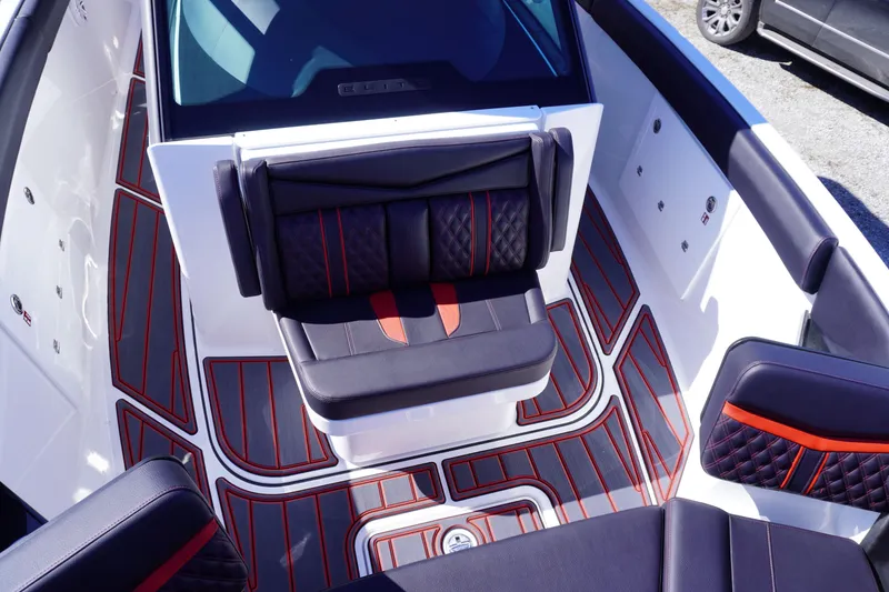 Slide: The Image of 2025 Monterey Elite 30 OB boat interior with stylish seating and modern design. - 18