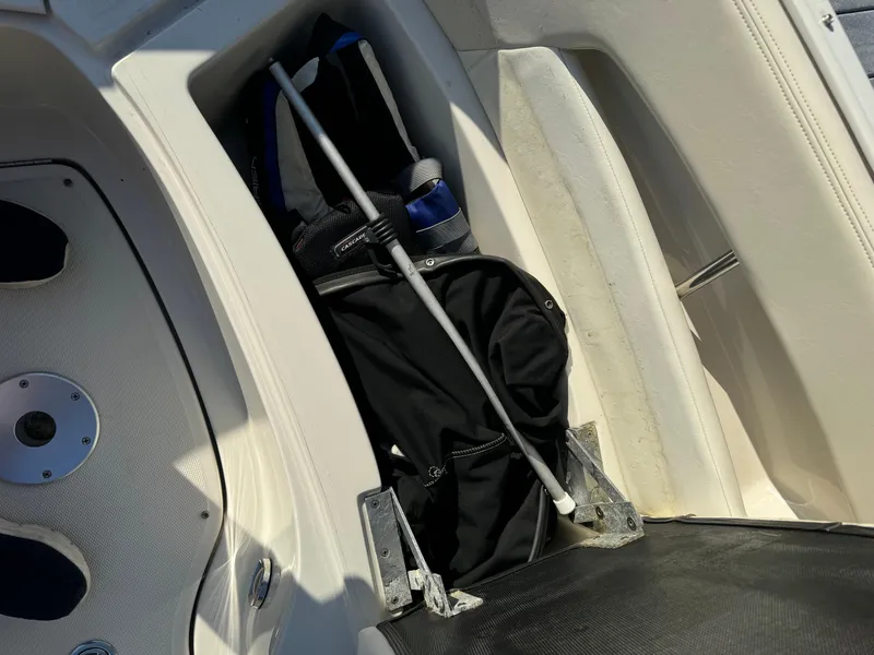 Slide: The Image of Storage compartment on 2008 Sea Ray 230 Sundeck boat with equipment. - 14