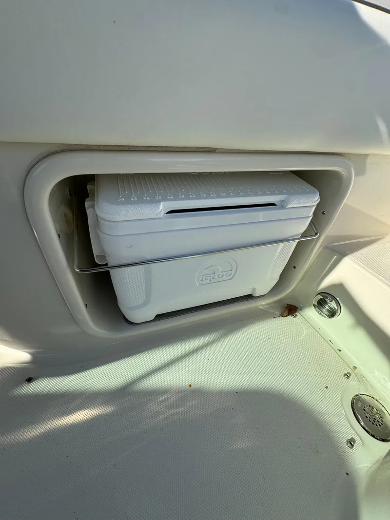 Slide: The Image of Built-in cooler storage on 2008 Sea Ray 230 Sundeck boat. - 7