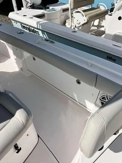Slide: The Image of 2022 Everglades 273 CC boat interior with seating and storage. - 12