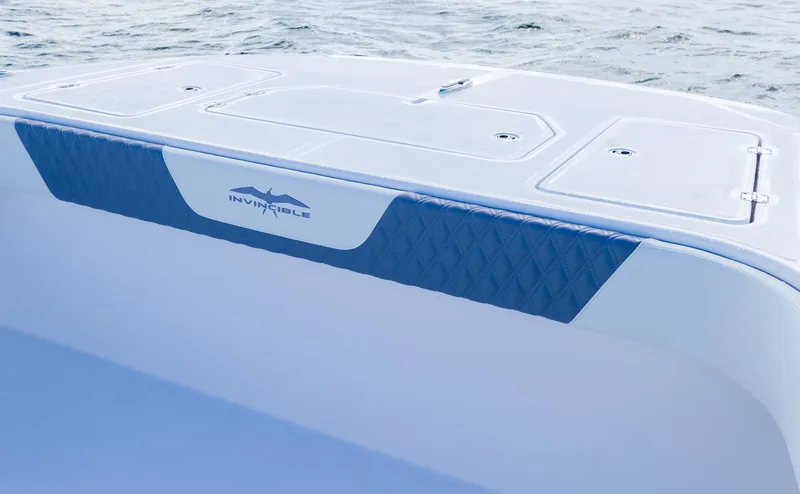Slide: The Image of 2025 Invincible 35 Catamaran deck view on the water. - 11
