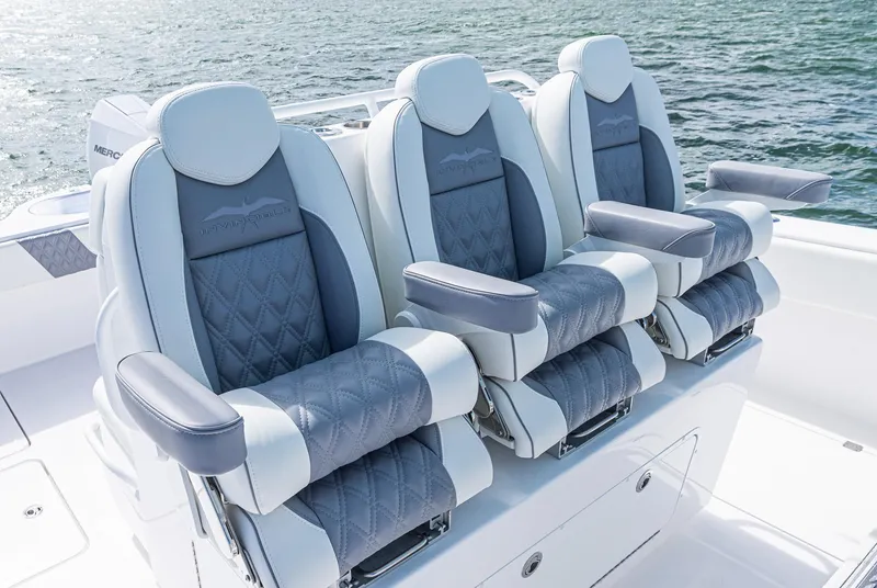 Slide: The Image of Luxury seating on 2025 Invincible 35 Catamaran, featuring elegant design and comfort. - 18