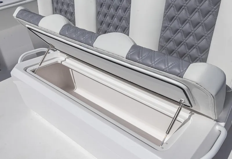 Slide: The Image of 2025 Invincible 35 Catamaran seat storage with quilted upholstery. - 24