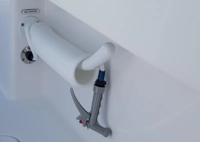 Slide: The Image of Saltwater hose and nozzle on 2025 Invincible 35 Catamaran. - 31
