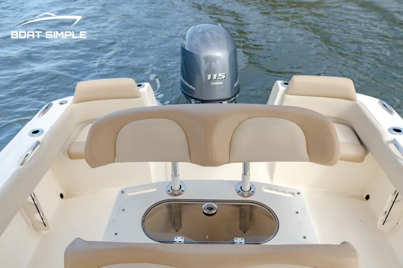 Slide: The Image of 2021 Scout 195 Sportfish boat with Yamaha 115 engine on water. - 13