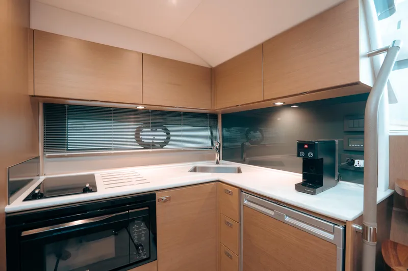 Slide: The Image of Modern kitchen in 2021 Princess V40 yacht with sleek cabinetry and appliances. - 10