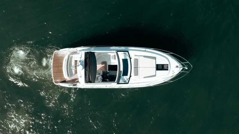 Slide: The Image of Aerial view of 2021 Princess V40 yacht cruising on open water. - 9