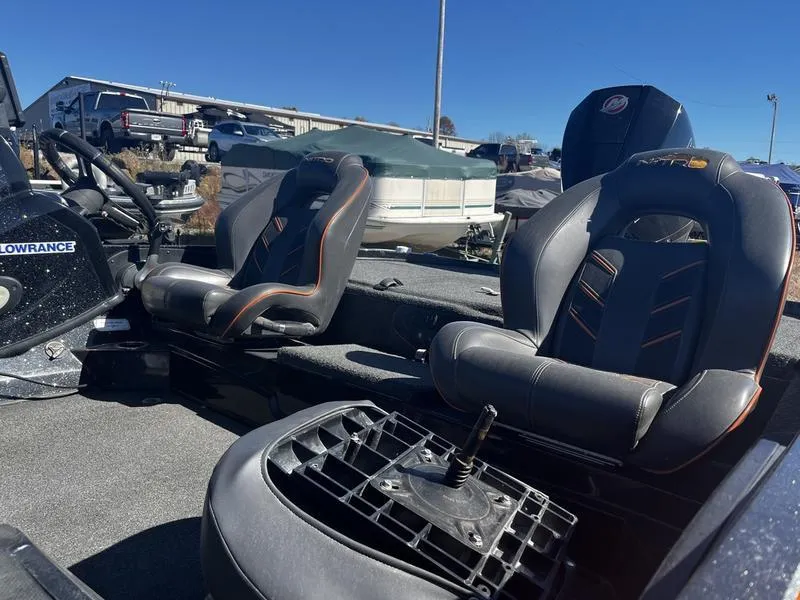 Slide: The Image of 2019 Nitro Z18 boat interior with two seats and steering console. - 3