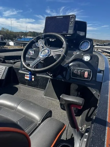 Slide: The Image of 2019 Nitro Z18 boat dashboard with steering wheel and navigation system. - 4