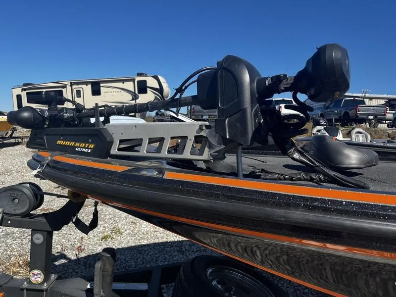 Slide: The Image of 2019 Nitro Z18 boat with Minn Kota Ultrex motor, parked outdoors. - 6