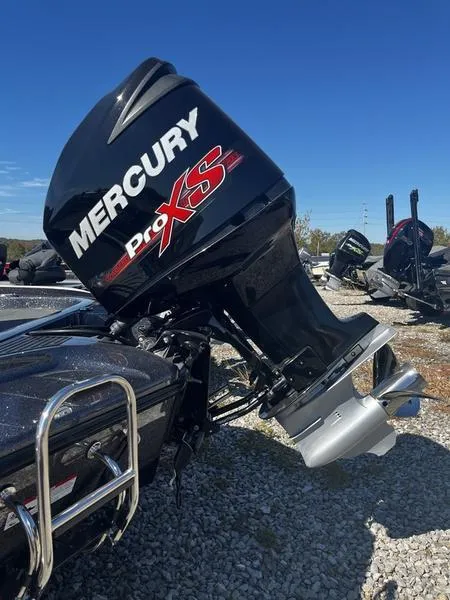 Slide: The Image of 2018 Ranger Z519 boat with Mercury ProXS outboard motor on gravel. - 4