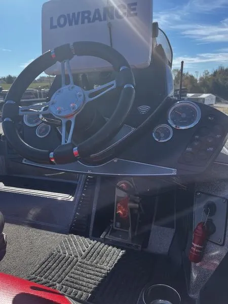 Slide: The Image of 2018 Ranger Z519 boat dashboard with Lowrance electronics and steering wheel. - 6