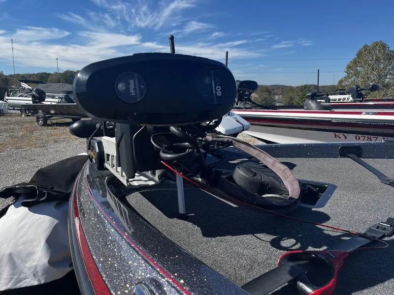 Slide: The Image of 2018 Ranger Z519 boat with trolling motor on deck, parked outdoors. - 8