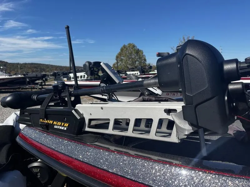 Slide: The Image of 2018 Ranger Z519 boat with Minn Kota Ultrex trolling motor in a marina. - 9