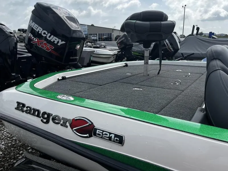 Slide: The Image of 2018 Ranger Z521C boat with Mercury Pro XS engine, green and white design. - 7