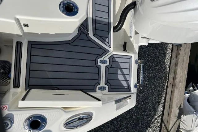 Slide: The Image of 2025 Cobia 265 Center Console Open boat deck with sleek design and modern features. - 11