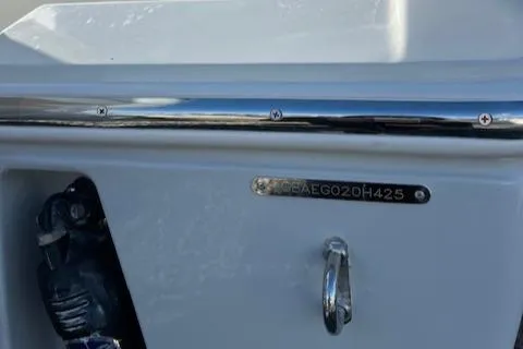 Slide: The Image of 2025 Cobia 265 Center Console Open boat detail with identification plate. - 20