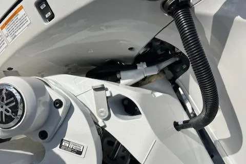 Slide: The Image of Close-up of 2025 Cobia 265 Center Console Open boat's mechanical components. - 22