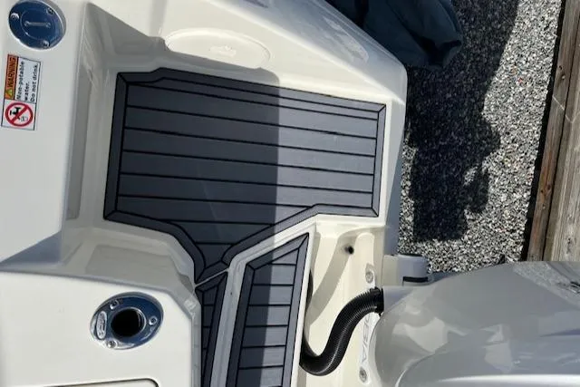 Slide: The Image of 2025 Cobia 265 Center Console Open boat deck with non-slip surface. - 9