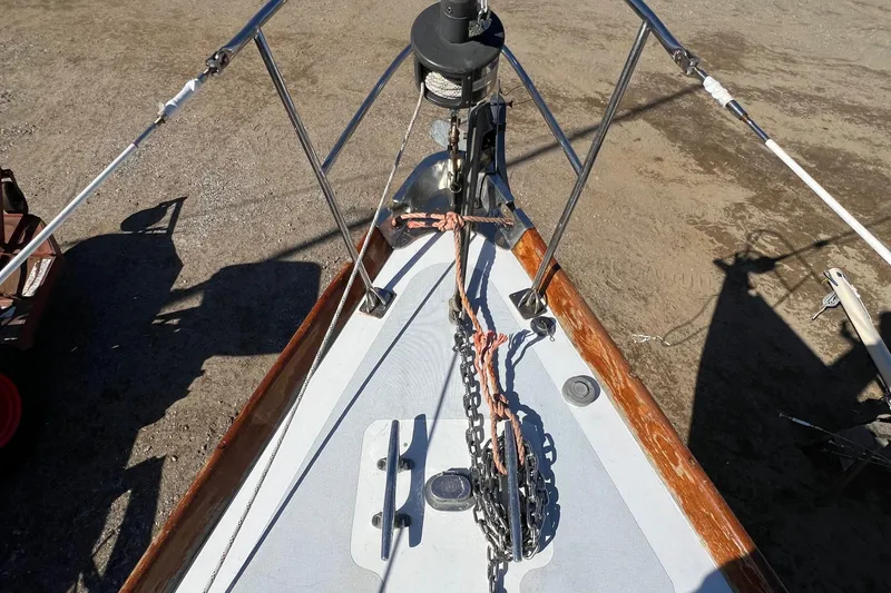 Slide: The Image of 1967 Hinckley Bermuda sailboat deck with anchor chain and rigging. - 14