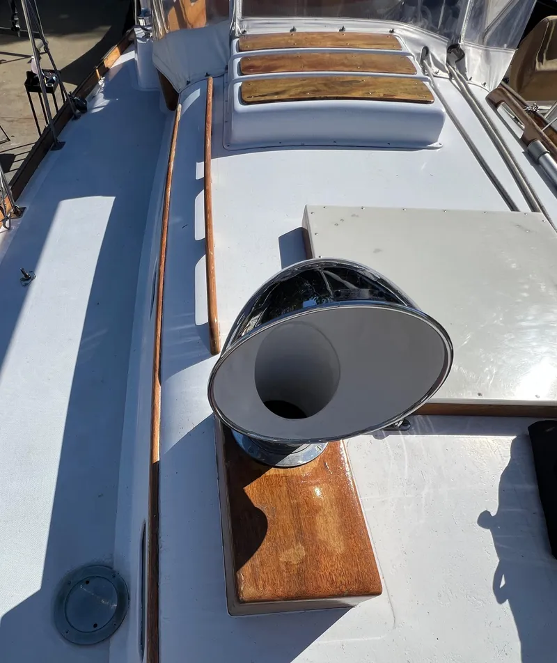 Slide: The Image of 1967 Hinckley Bermuda yacht deck with wooden accents and chrome vent. - 18